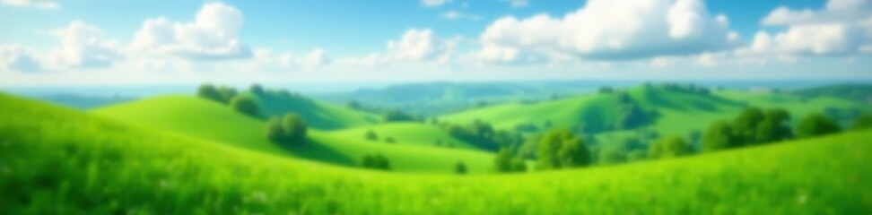 Blurred vibrant green hills, fluffy white clouds, sky, blur