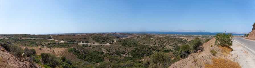 Scenic view to coast from high hills on Greek Island