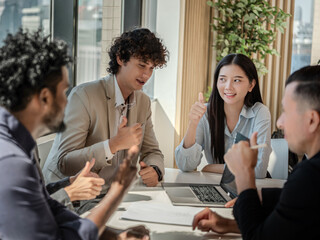 CEO or meeting leader giving thumbs up, liking work or business partner while shaking hands with businessman, professional team making legal business deal after negotiation is completed,