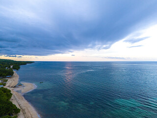 East Sumba, East Nusa Tenggara, Indonesia –  03. 06. 2025 – Towards Dusk on the Northern Side of Waingapu Beach, Accompanied by Boats and the Beauty of the Sunset