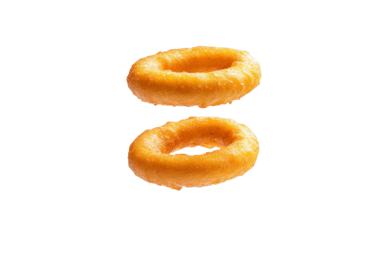 Two fried onion rings are floating in the air, isolated