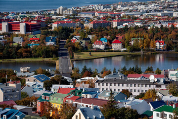 Houses by Lake Tjornin in central Reykjavik - the capital city of Iceland