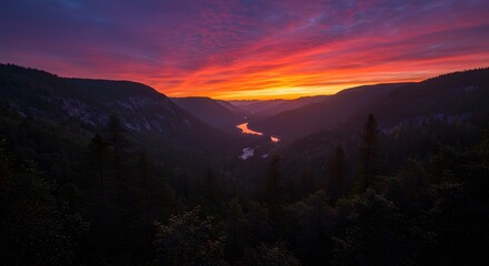 Fiery Sunset over Mountain River Valley Landscape