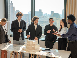 Professional Team Collaborating and Brainstorming in Modern Office