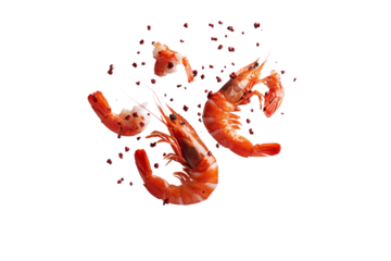 Close up of shrimp with pepper flakes on top, isolated