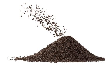 Pile of brown powder is scattered on a white background, isolated