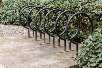Empty bike parking. Parking space or spot for multiple bikes. place for Parking at the house or shop of bicycles or scooters, environmental transport in the city. 