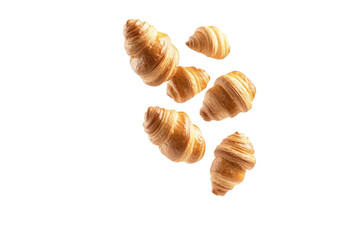 Close up of a few croissants in the air, isolated