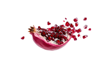 Close up of a red pomegranate with a few seeds missing, isolated