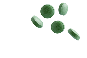 Bunch of green pills are flying through the air, isolated