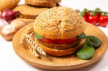 Make burger buns with vegan or vegetarian patties or burgers made from grains, vital wheat gluten food, grilled healthy food