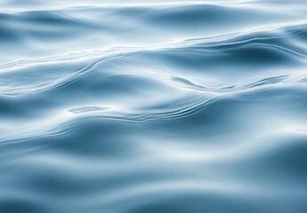 Obraz premium Tranquil Blue Water Surface with Gentle Waves Reflecting Light in a Serene Setting, Ideal for Nature and Relaxation Themes