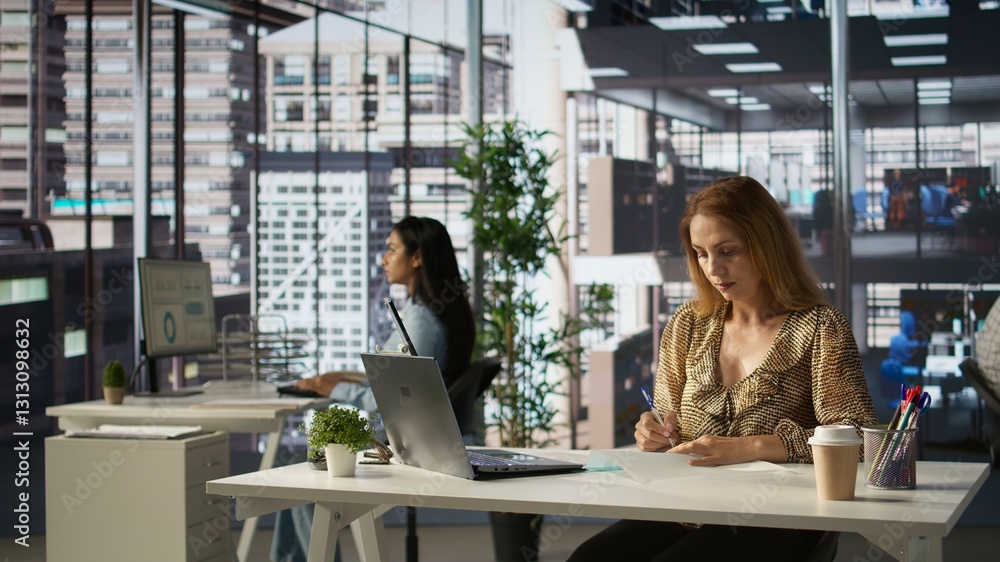 Poster female ceo engaging in project management using tech tools to set goals and objectives, solve proble