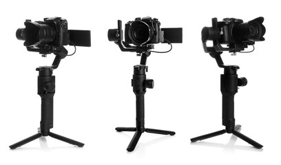Modern camera with tripod on white background, set. Professional photographer's equipment