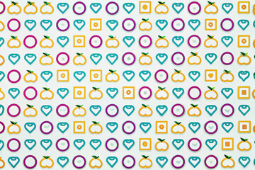 Colorful geometric shapes and fruit pattern on white background.
