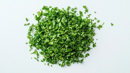 Obraz premium Freshly Chopped Green Herbs on Clean White Background