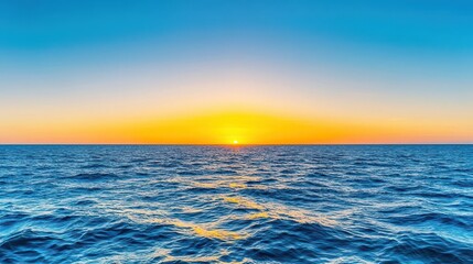 Obraz premium Breathtaking sunset over the ocean with fiery colors reflecting on the water surface creating a stunning view