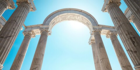 Fototapeta premium Ancient marble pillars form an ellipse against a vibrant blue sky, blue, landscape, ellipse