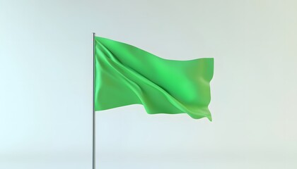 A solid green flag waves on a silver pole