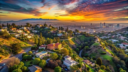 Obraz premium Los Angeles Sunset Panorama: Aerial View of Homes from Hollywood Hills Hiking Trail