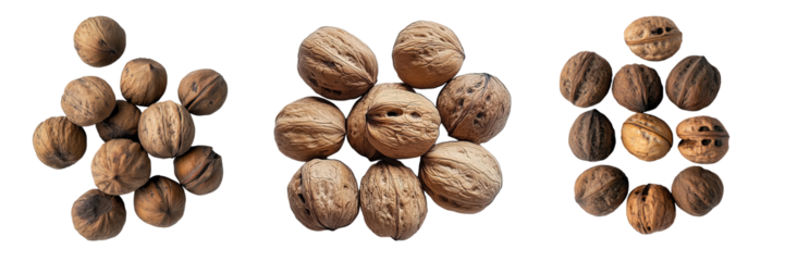 a handful of walnuts with their rough brown shell and smooth inner nut, high in omega-3, isolated on white or transparent background.