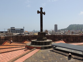 Cross at the top of the Gothic cathedral in Barcelona