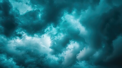 Fototapeta premium Dramatic Turquoise Sky with Clouds and Light Shining Through