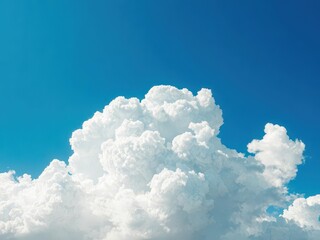 Naklejka premium Abstract fluffy white cloud against vibrant blue sky, weather,ethereal
