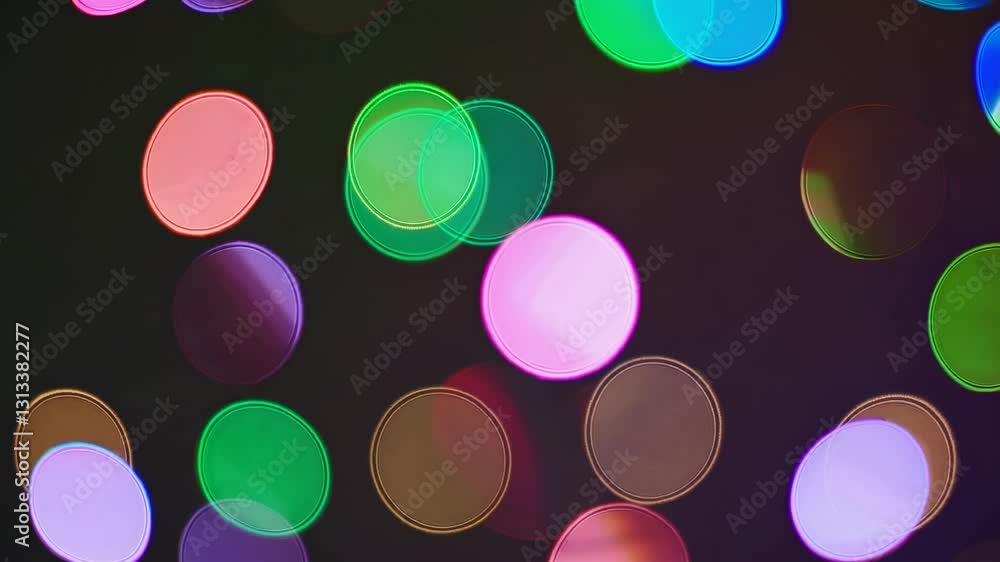 Poster abstract video with colorful bokeh lights in soft focus. shot from a straight angle, creating a drea
