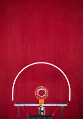 High angle view from above of a basketball hoop and a red basketball court. Good generic sport photo with lots of copy space	
