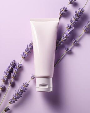 Elegant White Skincare Tube Mockup for Hand Cream, Soap and Lotion Laying on a Bundle of Lavender Flowers on Purple Background.