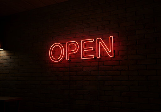 A glowing neon sign spelling "OPEN" against a brick wall.