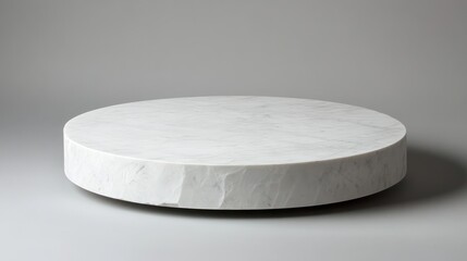 Marble circle pedestal on gray background
