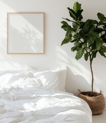 White bedroom with framed art and plant