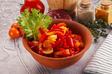 Diced raw bell red and yellow pepper