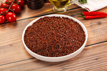 Red raw dry rice gor cooking