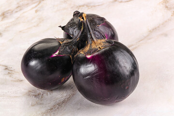 Raw violet and black eggplant
