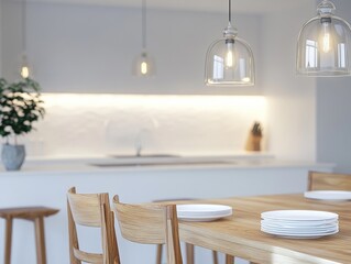 A kitchen with a white counter and a white wall. The kitchen has a table with two chairs and a bowl of plates