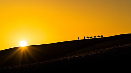 Fototapeta premium Camel caravan travels across desert at sunset, silhouetted against a vibrant horizon