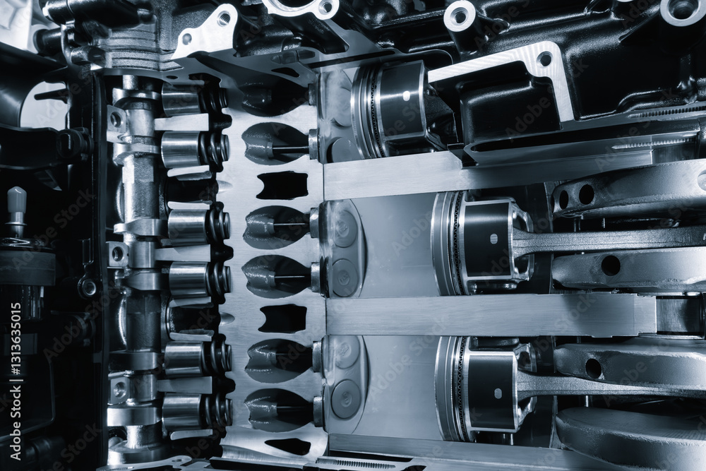 Leinwandbilder a close up of a car engine with the pistons and cylinders visible. concept of complexity and precisi