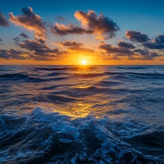 Obraz premium The Embrace of the Sun and the Ocean. Beautiful sunrise scenery over the sea with reflection on the surface. 