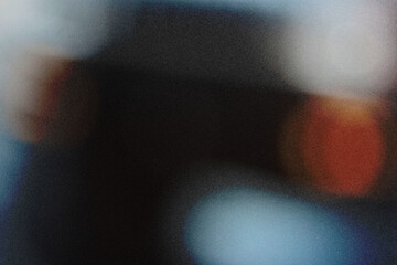 A smooth abstract background featuring dark tones blended with warm colors, ideal for creative...