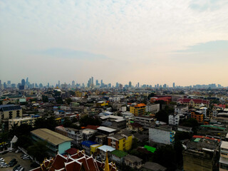 Aerial view of modern buildings and sprawling cityscape in Bangkok, Thailand