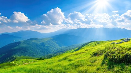 Fototapeta premium Serene Mountain Landscape Under Bright Blue Sky with Sun Rays