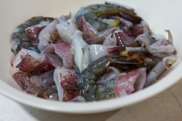 Fresh Shrimps And Squid On A Plate