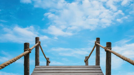 Naklejka premium Wooden Bridge Against Clear Blue Sky Representing Workplace Skills Leading to Success