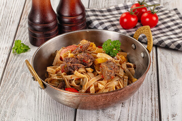 Asian udon noodles with beef