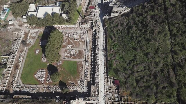 Aerial drone shot of the ancient city of Ephesus, the library of Celsus and the ancient Roman theater on a sunny day. High quality 4k footage