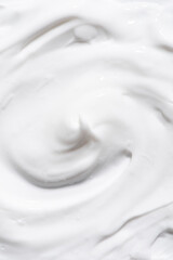 close up of white pristine smear texture background,  Creamy skincare product swatch 