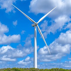 White Wind Turbine in a Blue Sky with Fluffy Clouds